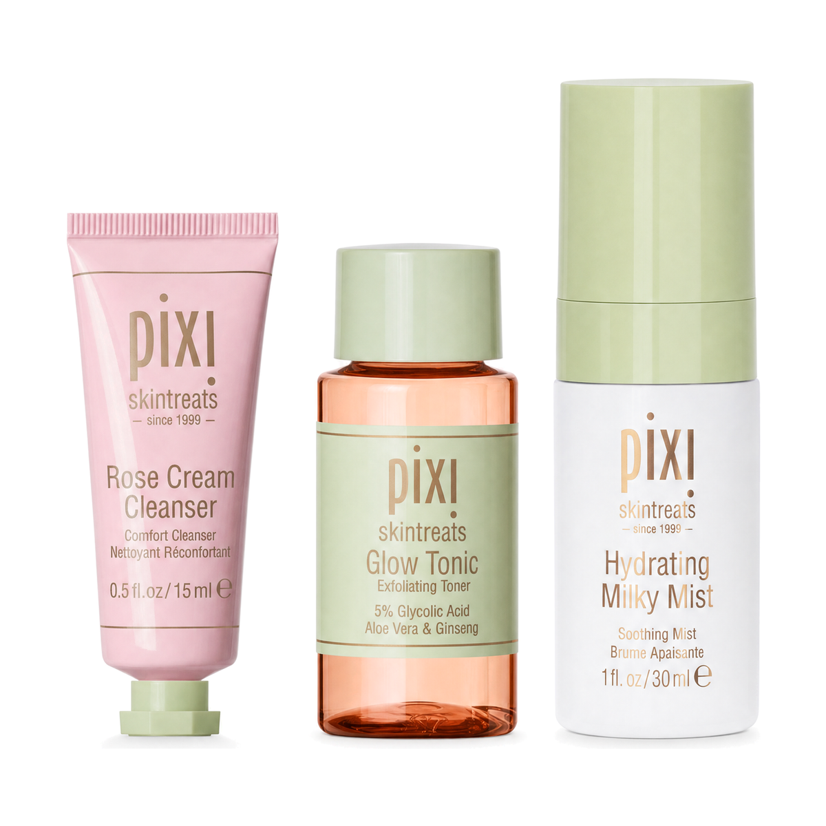 Three Pixi Skintreats skincare bottles and tubes arranged side by side on a white background: a pink Rose Cream Cleanser tube, an amber Glow Tonic bottle with a pale green cap, and a white Hydrating Milky Mist bottle with a pale green cap.