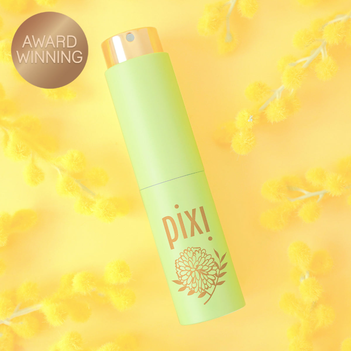Award Winning: PixiPerfume Mimosa shown on a yellow plant background