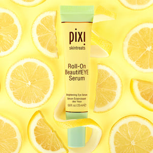 Pixi Roll-On BeautifEYE Serum with lemon slices on a yellow background